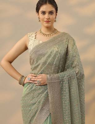 sea green embroidered nylon saree with unstitched blouse piece 5