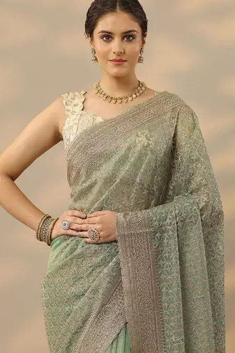 sea green embroidered nylon saree with unstitched blouse piece