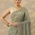 sea green embroidered nylon saree with unstitched blouse piece