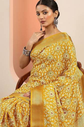 yellow printed saree with unstitched blouse piece