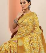 yellow printed saree with unstitched blouse piece