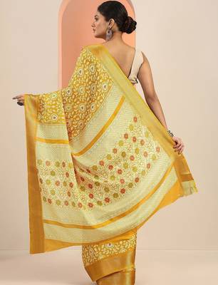 yellow printed saree with unstitched blouse piece 4