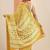 yellow printed saree with unstitched blouse piece