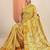 yellow printed saree with unstitched blouse piece