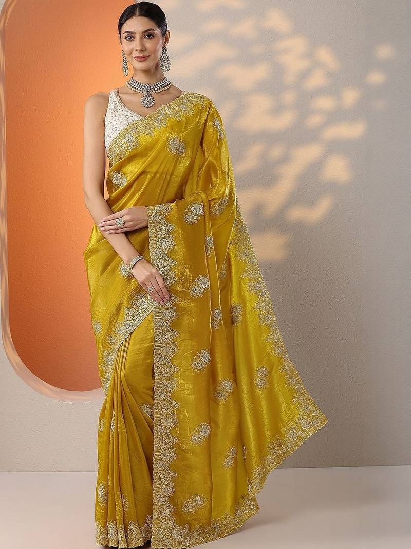 yellow embroidered banarasi organza saree with unstitched blouse piece