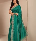 green embellished saree with unstitched blouse piece