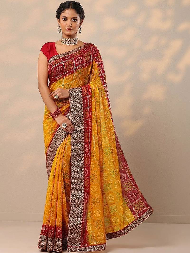 yellow bandhani printed georgette saree with unstitched blouse piece