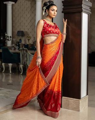 orange bandhani printed georgette saree with unstitched blouse piece 1
