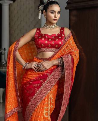 orange bandhani printed georgette saree with unstitched blouse piece 2