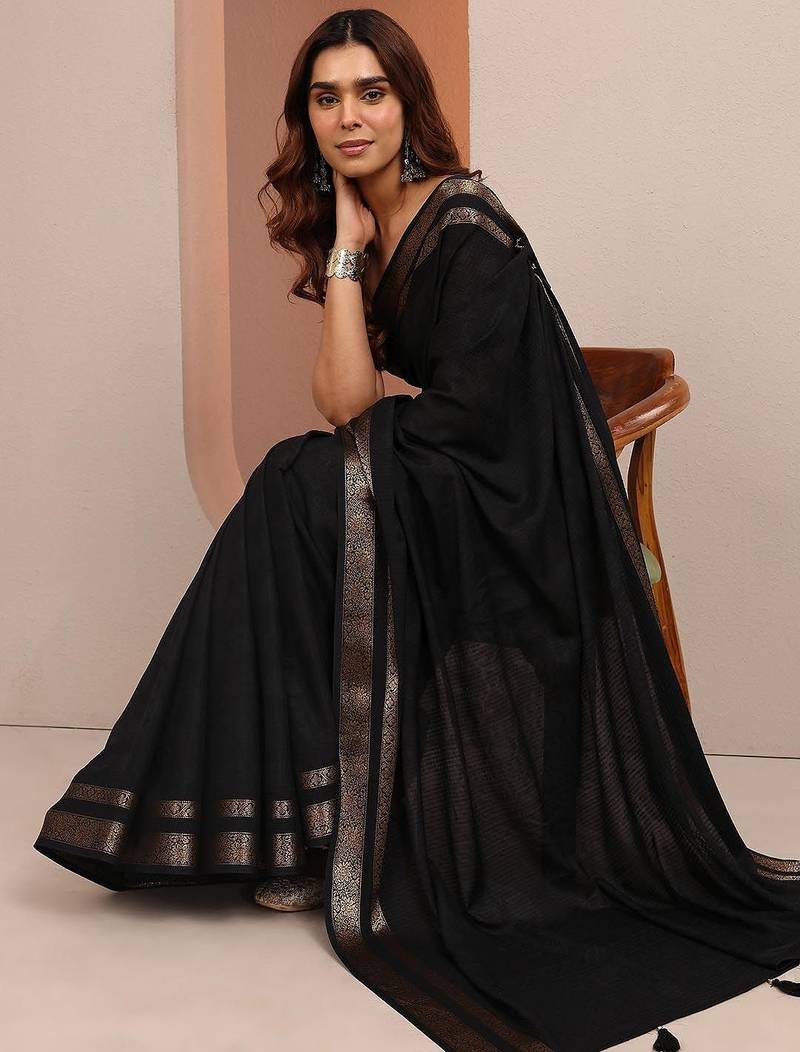 black printed saree with unstitched blouse piece