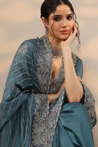 teal embellished banarasi chinon saree with unstitched blouse piece