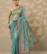 turquoise blue embroidered nylon saree with unstitched blouse piece