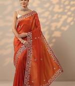 orange embroidered organza saree with unstitched blouse piece