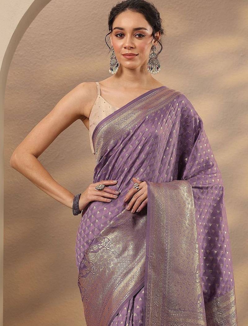 purple woven design saree with unstitched blouse piece