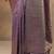 purple woven design saree with unstitched blouse piece