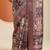 purple printed saree with unstitched blouse piece