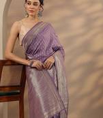 purple woven design saree with unstitched blouse piece