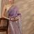 purple woven design saree with unstitched blouse piece