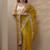 yellow embroidered chinon saree with unstitched blouse piece