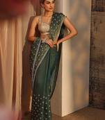 green floral embellished satin saree with unstitched blouse piece