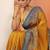 mustard printed saree with unstitched blouse piece