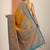 mustard printed saree with unstitched blouse piece