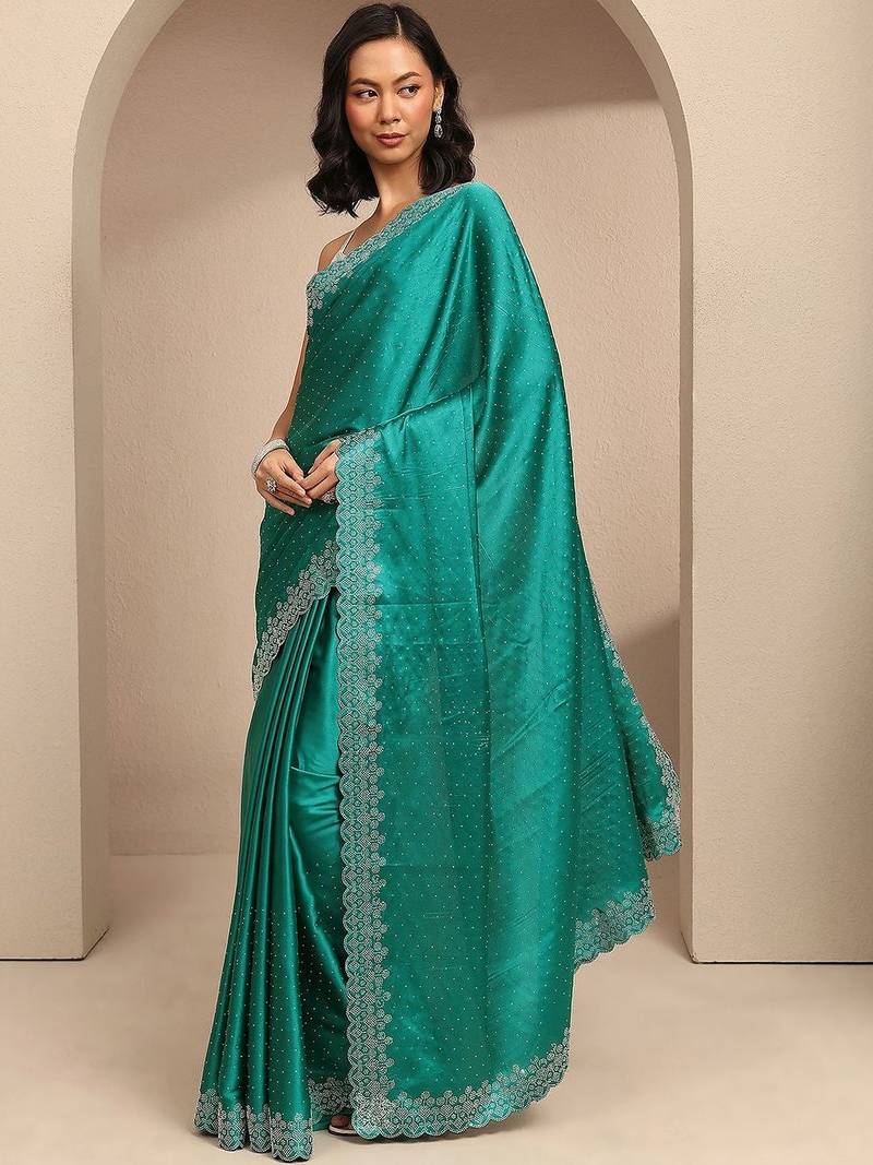 teal embellished saree with unstitched blouse piece