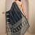 navy blue printed saree with unstitched blouse piece