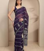 purple ethnic motifs printed saree with unstitched blouse piece