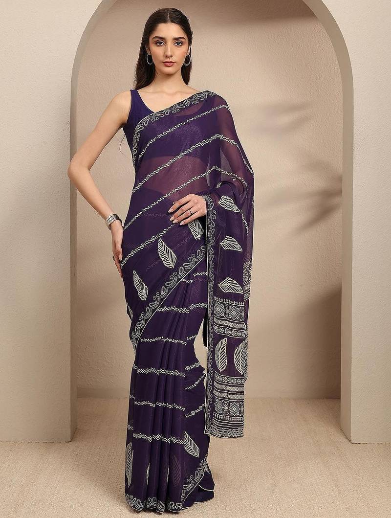 purple ethnic motifs printed saree with unstitched blouse piece