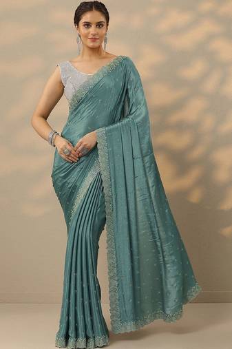 teal embellished saree with unstitched blouse piece