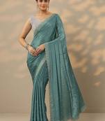 teal embellished saree with unstitched blouse piece