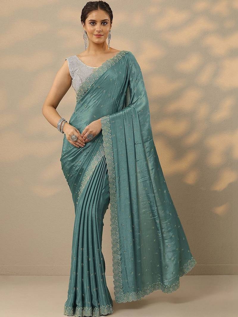 teal embellished saree with unstitched blouse piece