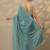 teal embellished saree with unstitched blouse piece