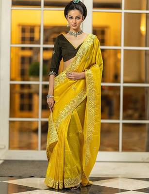 yellow embroidered organza saree with unstitched blouse piece 1