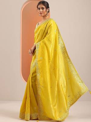 yellow embroidered organza saree with unstitched blouse piece 3