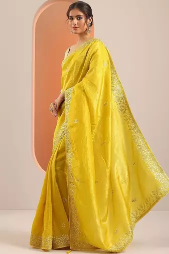 yellow embroidered organza saree with unstitched blouse piece