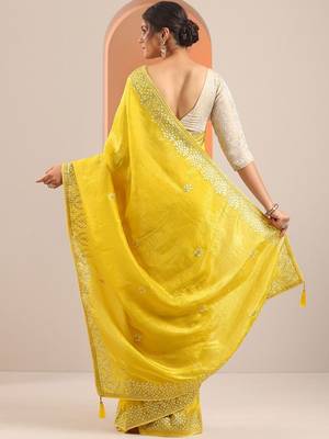 yellow embroidered organza saree with unstitched blouse piece 4