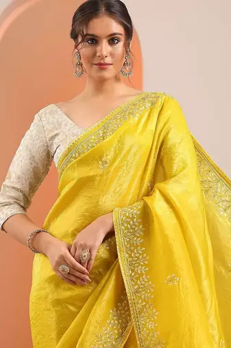 yellow embroidered organza saree with unstitched blouse piece