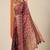 red printed saree with unstitched blouse piece