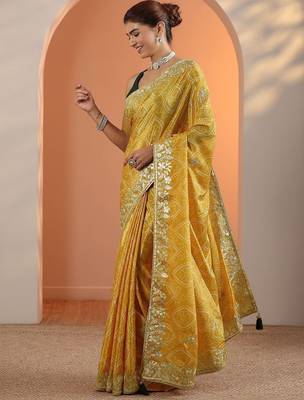 yellow bandhani printed chinon saree with unstitched blouse piece 3