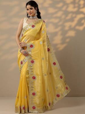 yellow embroidered organza saree with unstitched blouse piece 1