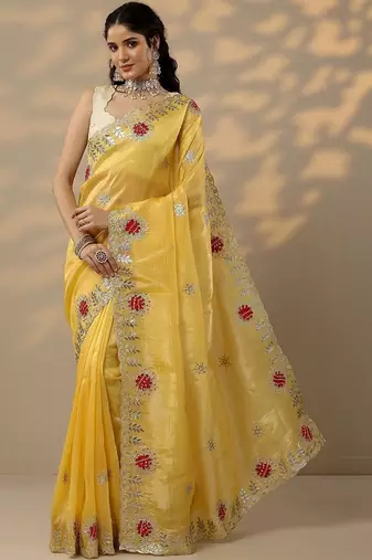 yellow embroidered organza saree with unstitched blouse piece