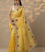 yellow embroidered organza saree with unstitched blouse piece