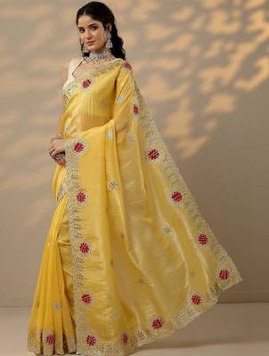 yellow embroidered organza saree with unstitched blouse piece 2