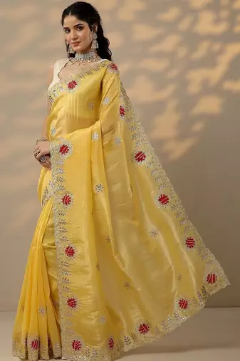 yellow embroidered organza saree with unstitched blouse piece