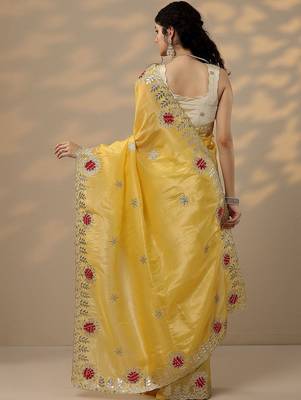 yellow embroidered organza saree with unstitched blouse piece 3