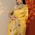 yellow embroidered organza saree with unstitched blouse piece