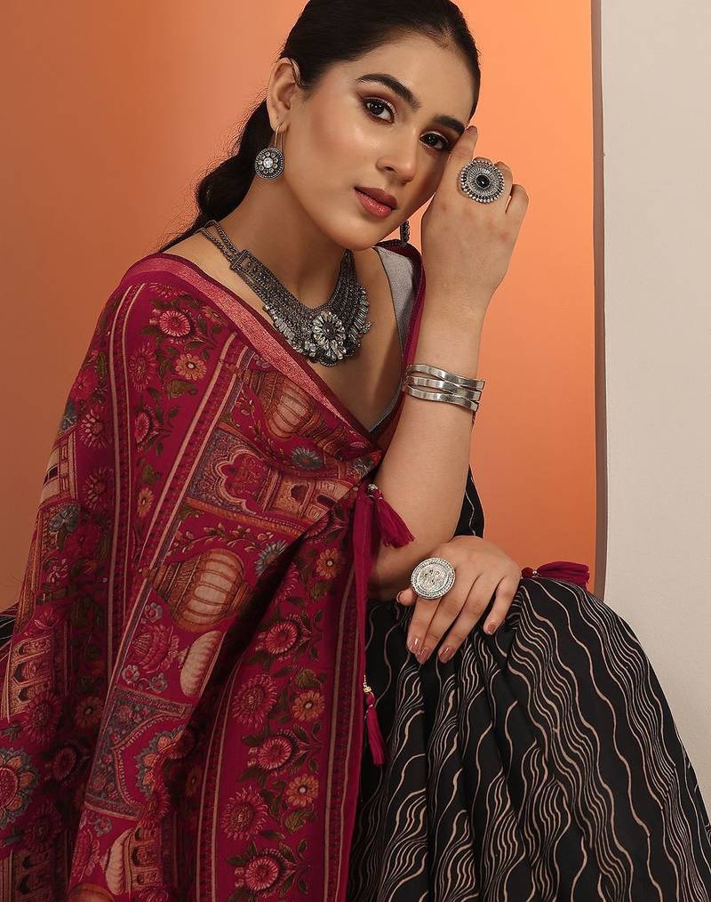 black printed saree with unstitched blouse piece