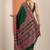 green printed saree with unstitched blouse piece
